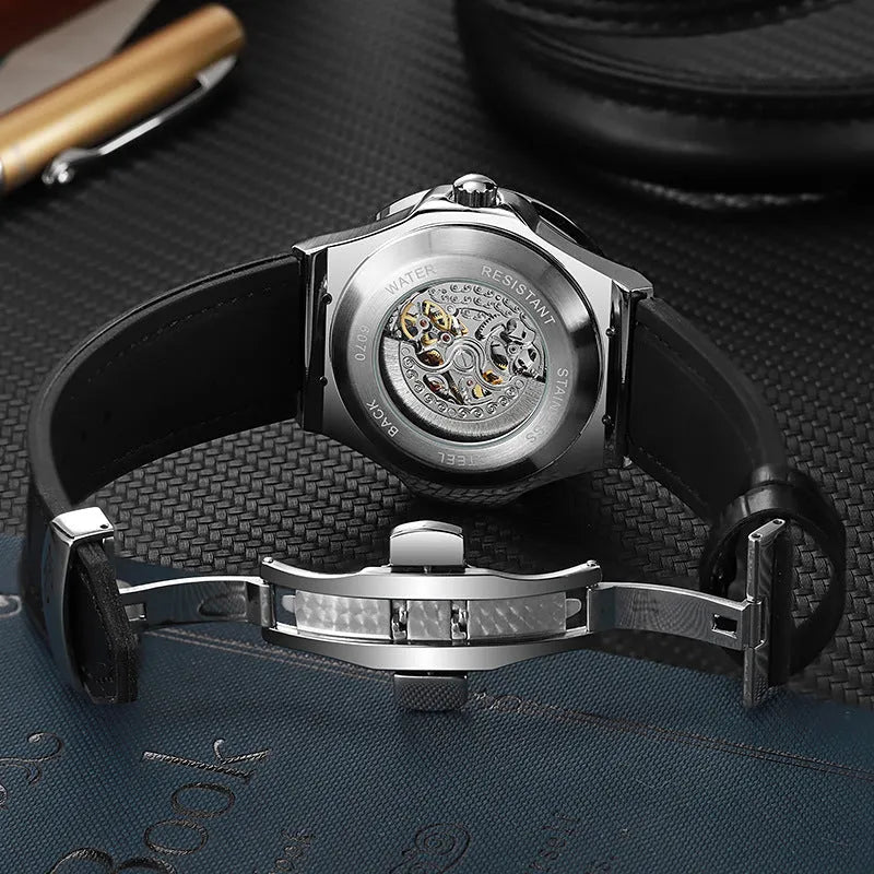 Men's automatic mechanical wristwatch with skeleton dial and diamond-studded stainless steel case.