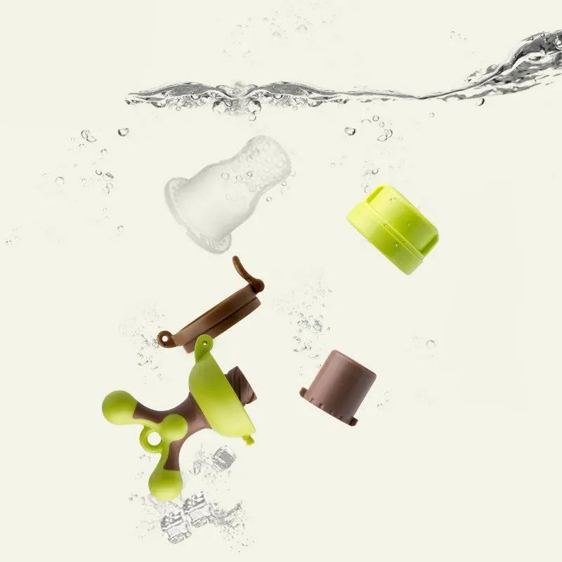 Polypropylene baby bite trainer for teething relief in green colour with textured chewing surface