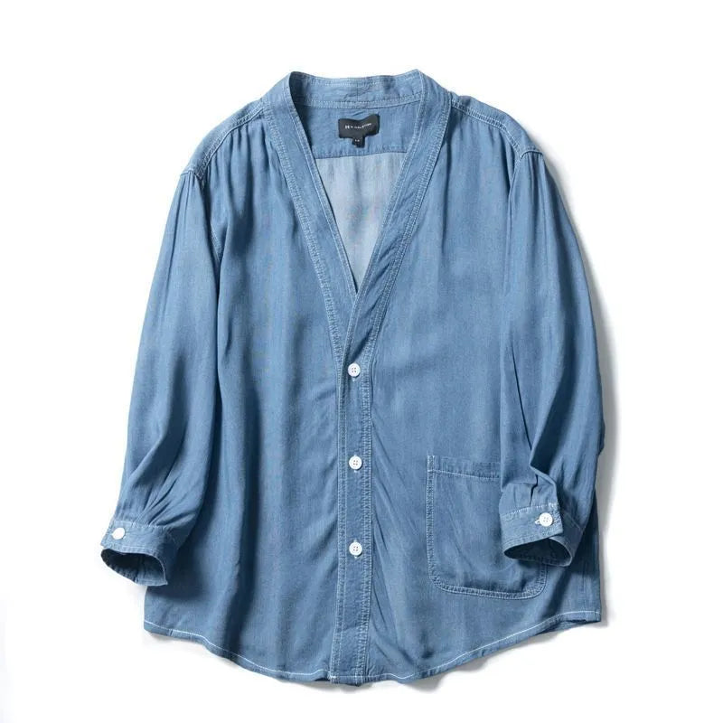 Men's dark blue three-quarter sleeve denim coat with V-neck collar and side pockets