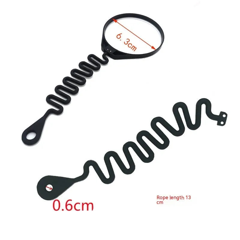 Black rubber Volvo fuel cap tether accessory showing circle band and separate rope designs