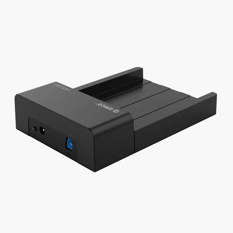 Black universal SATA hard drive enclosure for 2.5 and 3.5 inch drives with USB cable.