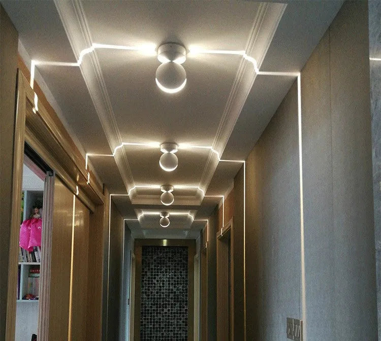 Modern aluminium and glass wall spotlight bar with multi-colour LED lighting