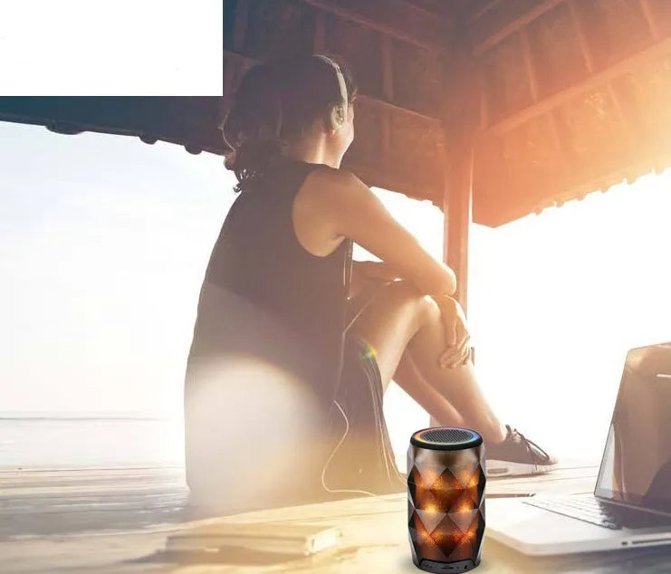 Black crystal diamond-cut Coca-Cola can shaped Bluetooth speaker lantern with colourful LED lights.