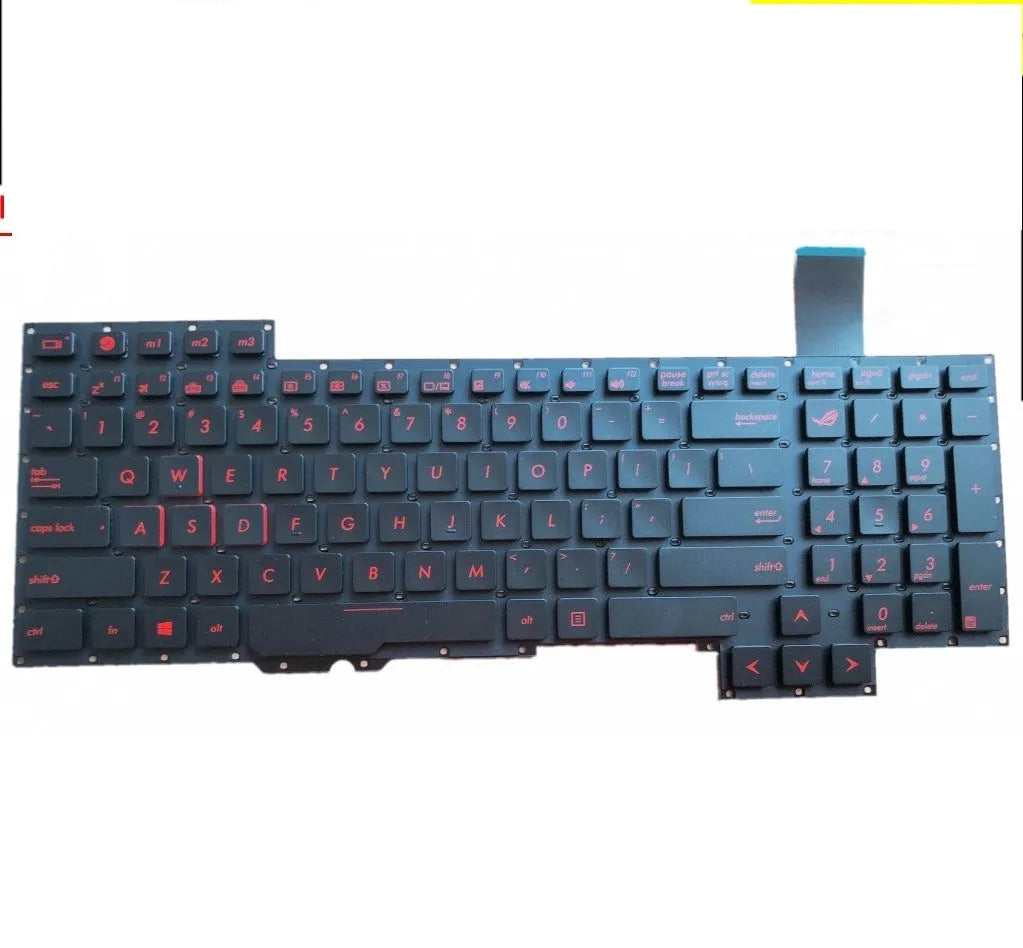 Black wired PS/2 keyboard with multimedia function keys on a desk