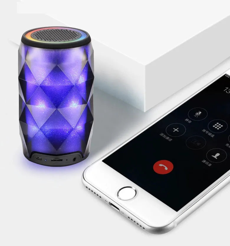 Black crystal diamond-cut Coca-Cola can shaped Bluetooth speaker lantern with colourful LED lights.