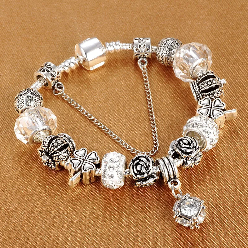 Multicolour beaded bracelet with alloy, glazed, and diamond beads on a white background