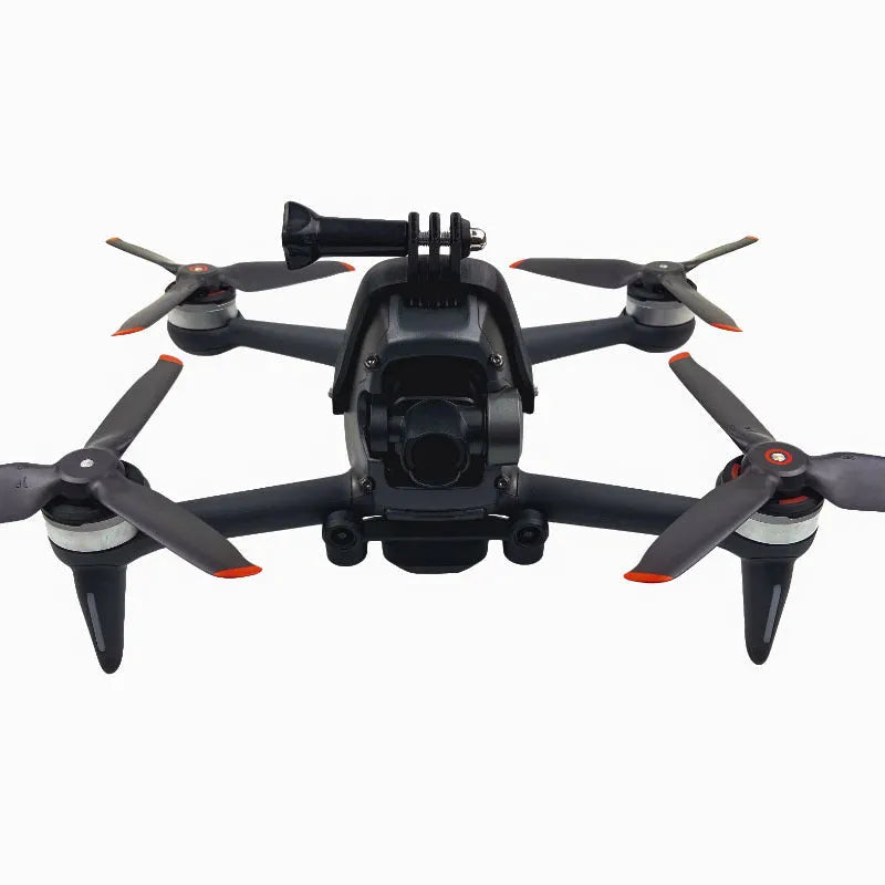 3D printed hard plastic FPV drone expansion bracket with soft sponge for top-mounting GoPro cameras.