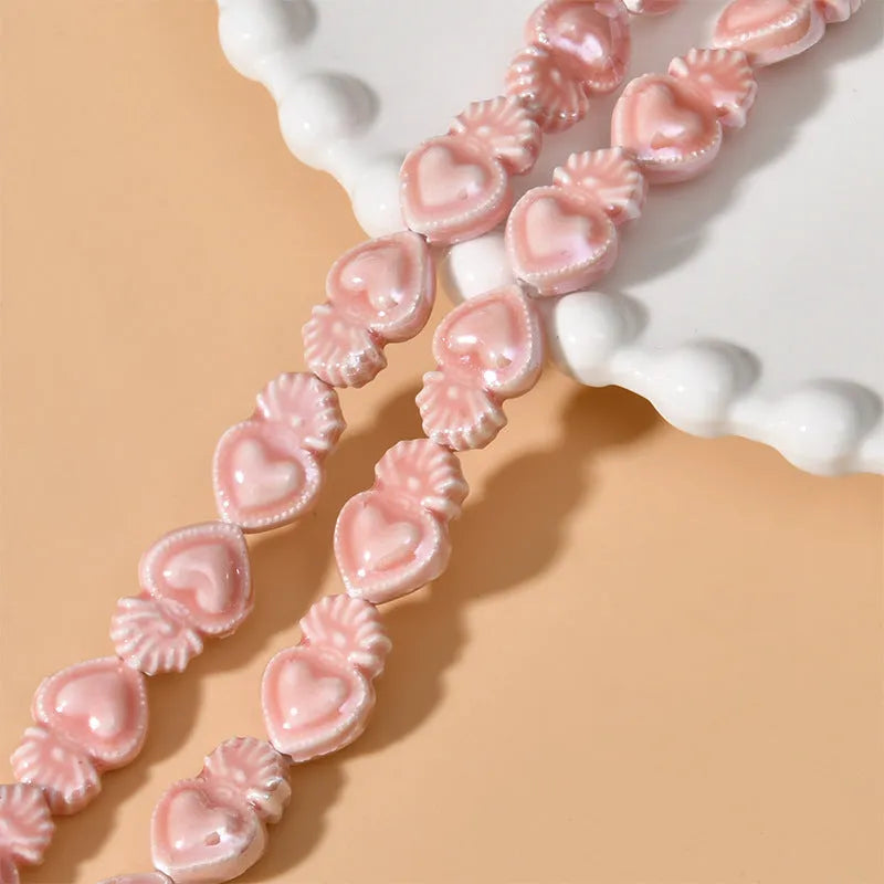 Ceramic love heart small torch shaped beads in various colours with straight holes for jewellery making