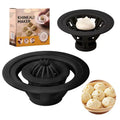 Set of four black plastic baozi and dumpling moulds for shaping steamed buns.