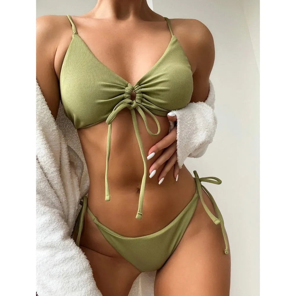 Women's solid colour drawstring bikini swimsuit in quick-dry fabric.