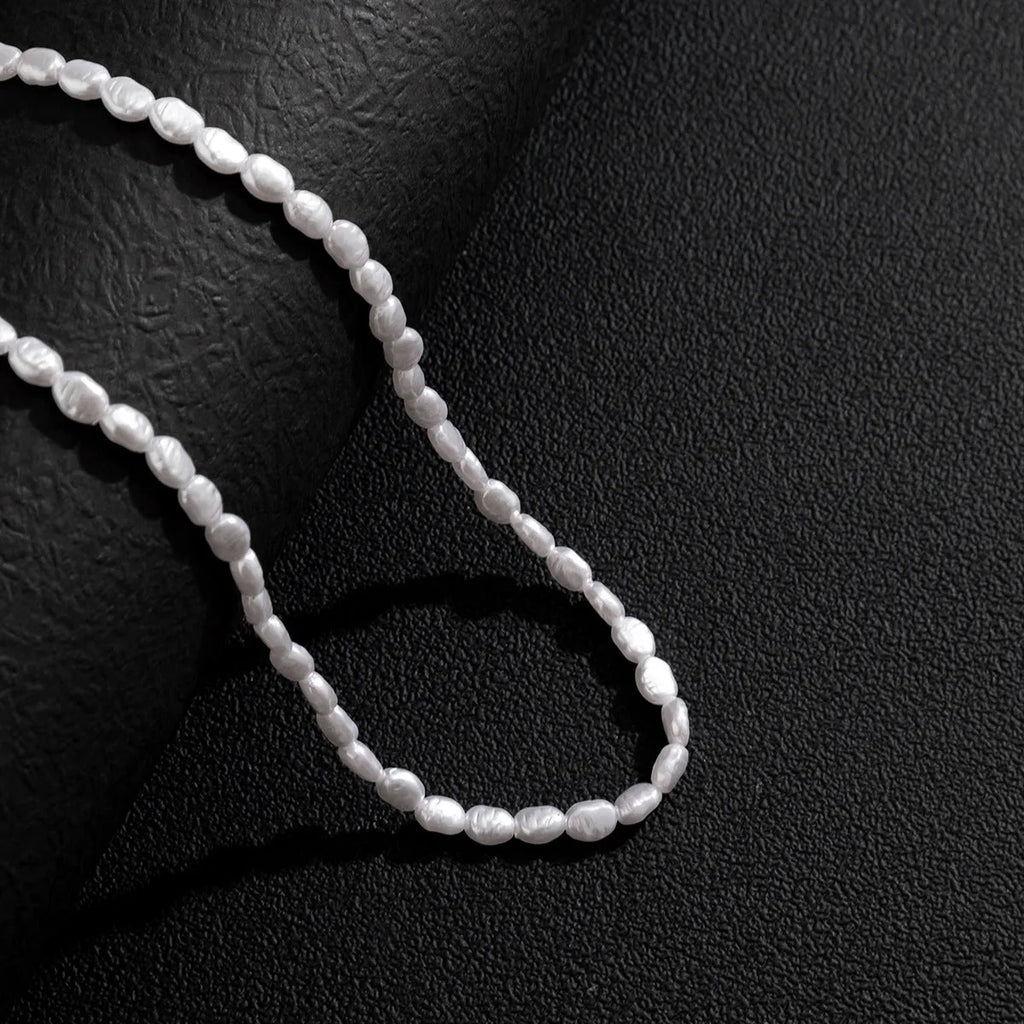 Men's white U-shaped Mother Pearl necklace on imitation pearl chain, adjustable 41-50cm length.