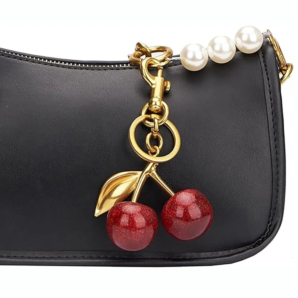 Zinc alloy cherry-shaped keychain pendant in red colour with three-dimensional design