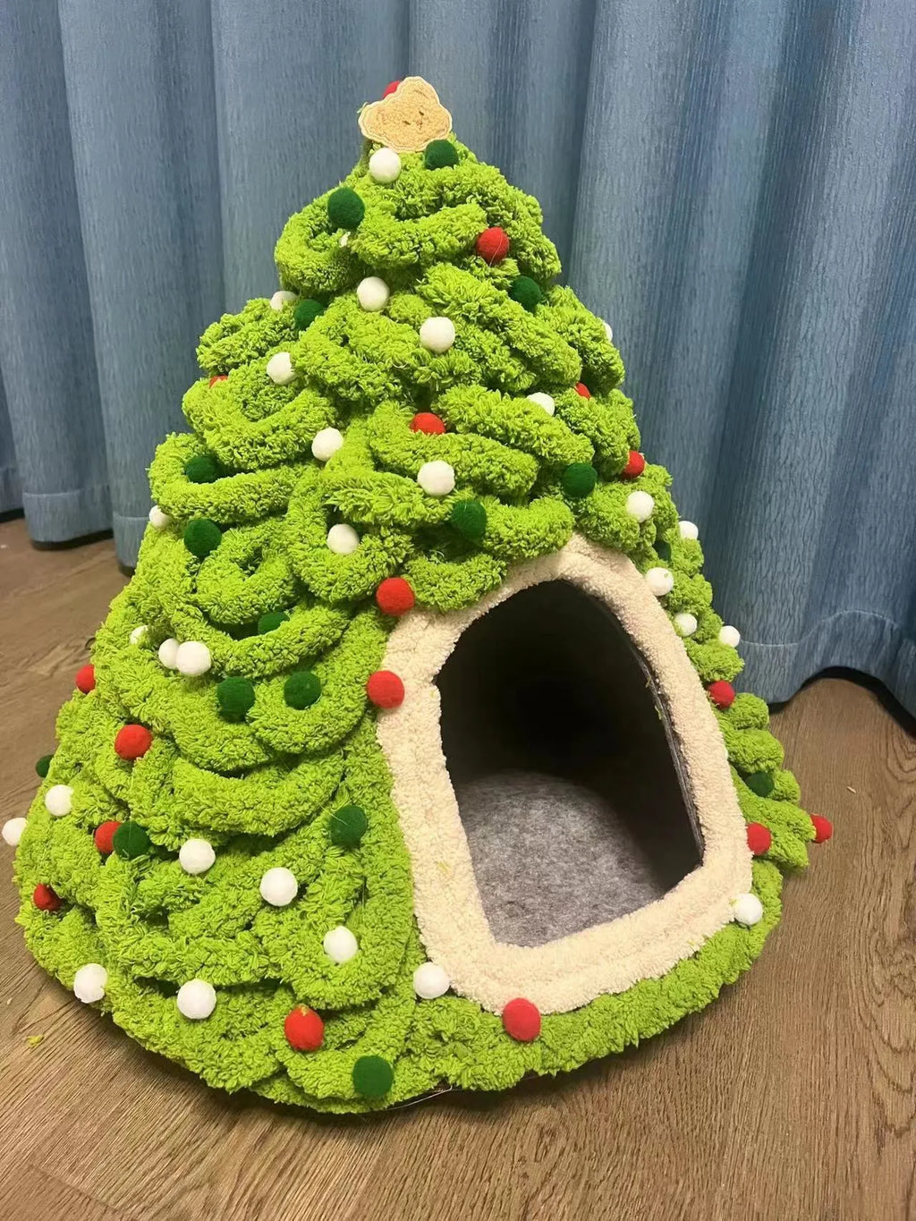 Grey cone-shaped felt cat house measuring 50cm wide with enclosed tent design