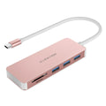 USB 3.0 hub multi-function card reader with three USB ports, SD slot, and TF slot on desk