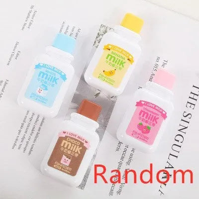 White creative correction tape dispenser shaped like a cute bottle with a curved ergonomic design