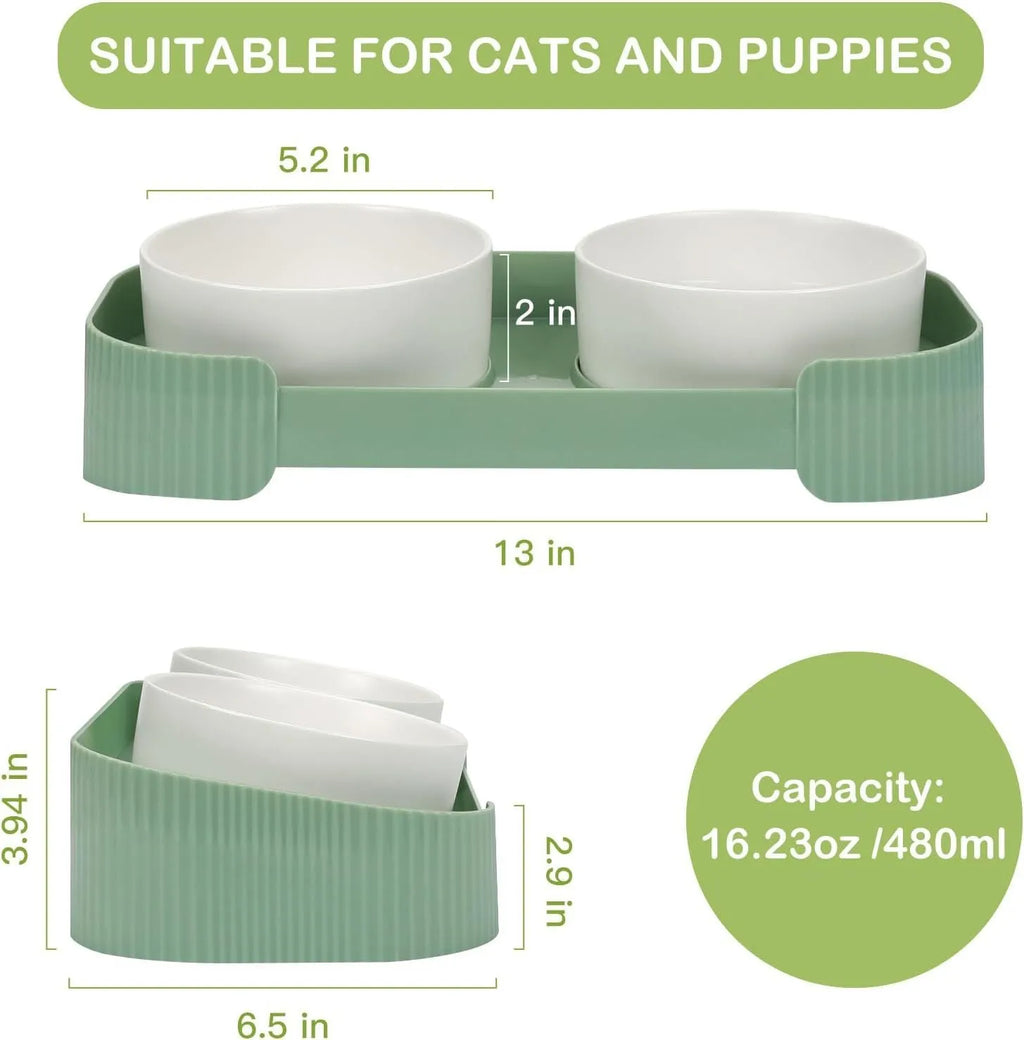 Green ceramic raised cat bowl set with two tilted bowls on non-slip base