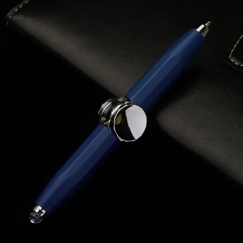 Metal gyro ballpoint pen with LED lights shown spinning, 10.5 cm long.