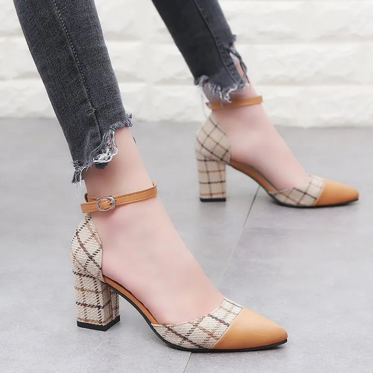 Thick heel high heels with buckle fastening, black colour, 7.5cm heel, side view