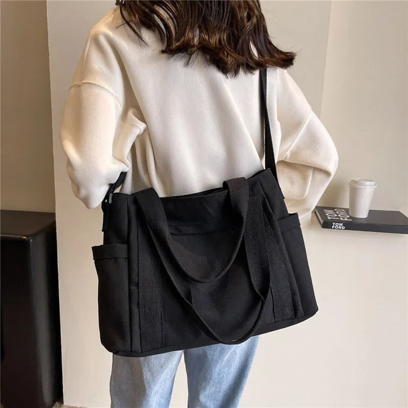 Women's polyester canvas shoulder tote bag with large capacity and internal mobile phone pocket storage