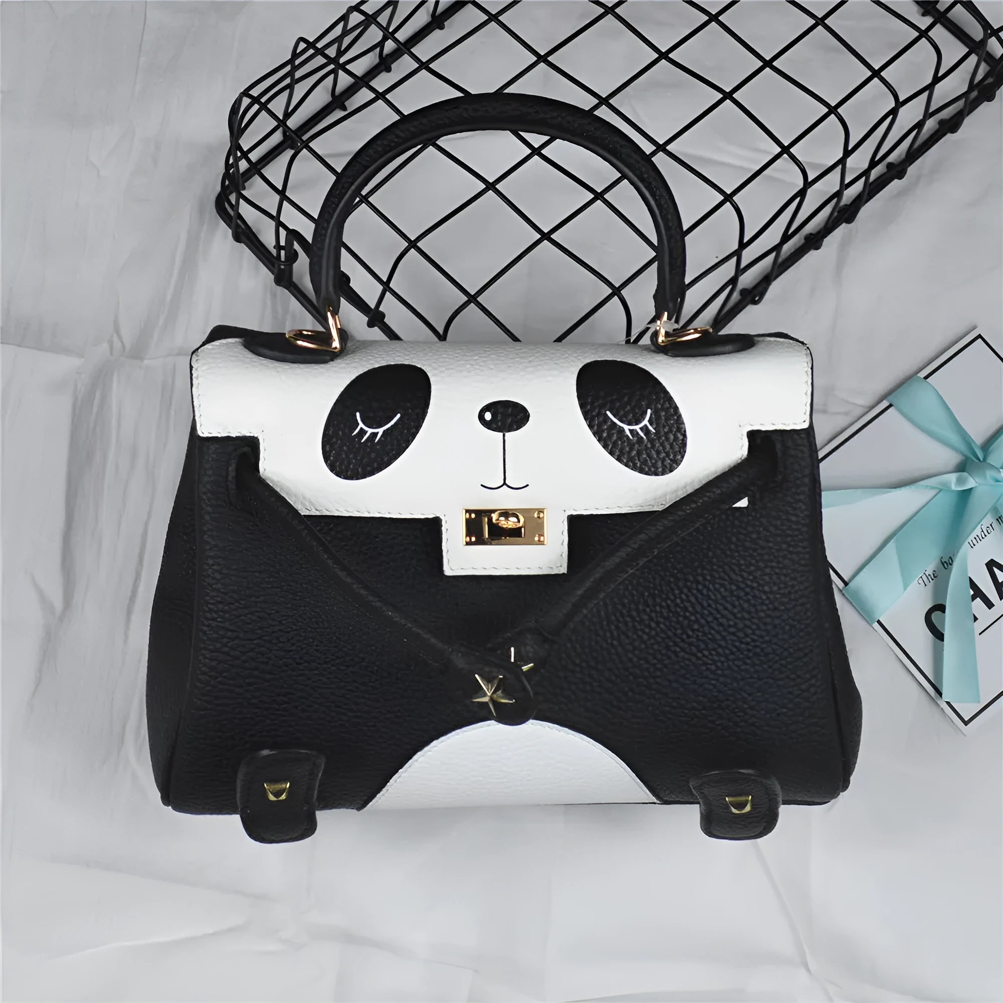 Panda print cow leather square handbag shown in two size options.
