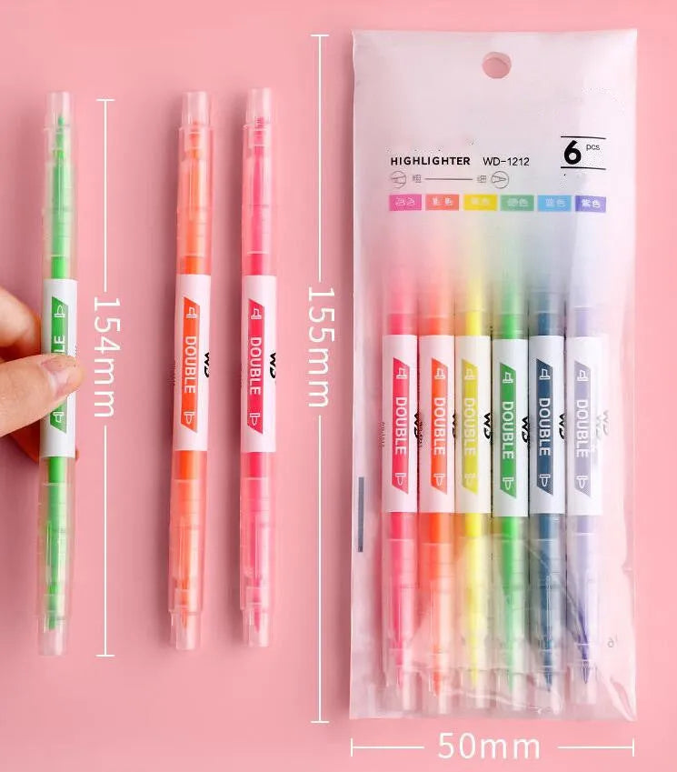 Six double-headed marker pens showing round and oblique nibs in assorted colours including orange, purple, yellow, green, blue, and pink