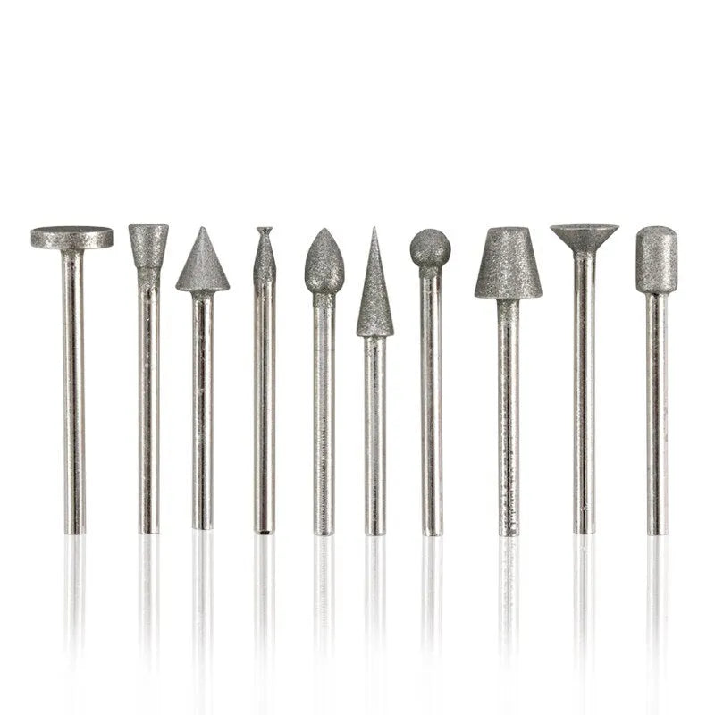 Set of gold-coloured alloy grinding heads with elliptical cone shapes and 3mm shanks