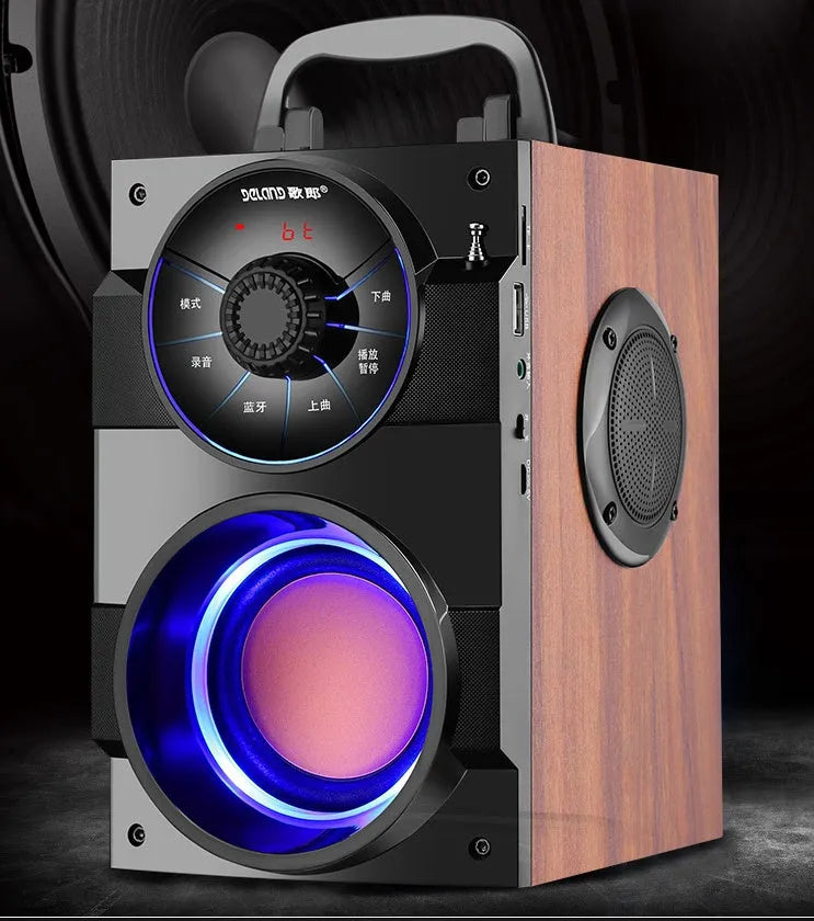 Black portable mini home audio system with subwoofer and 3.5mm audio cable
