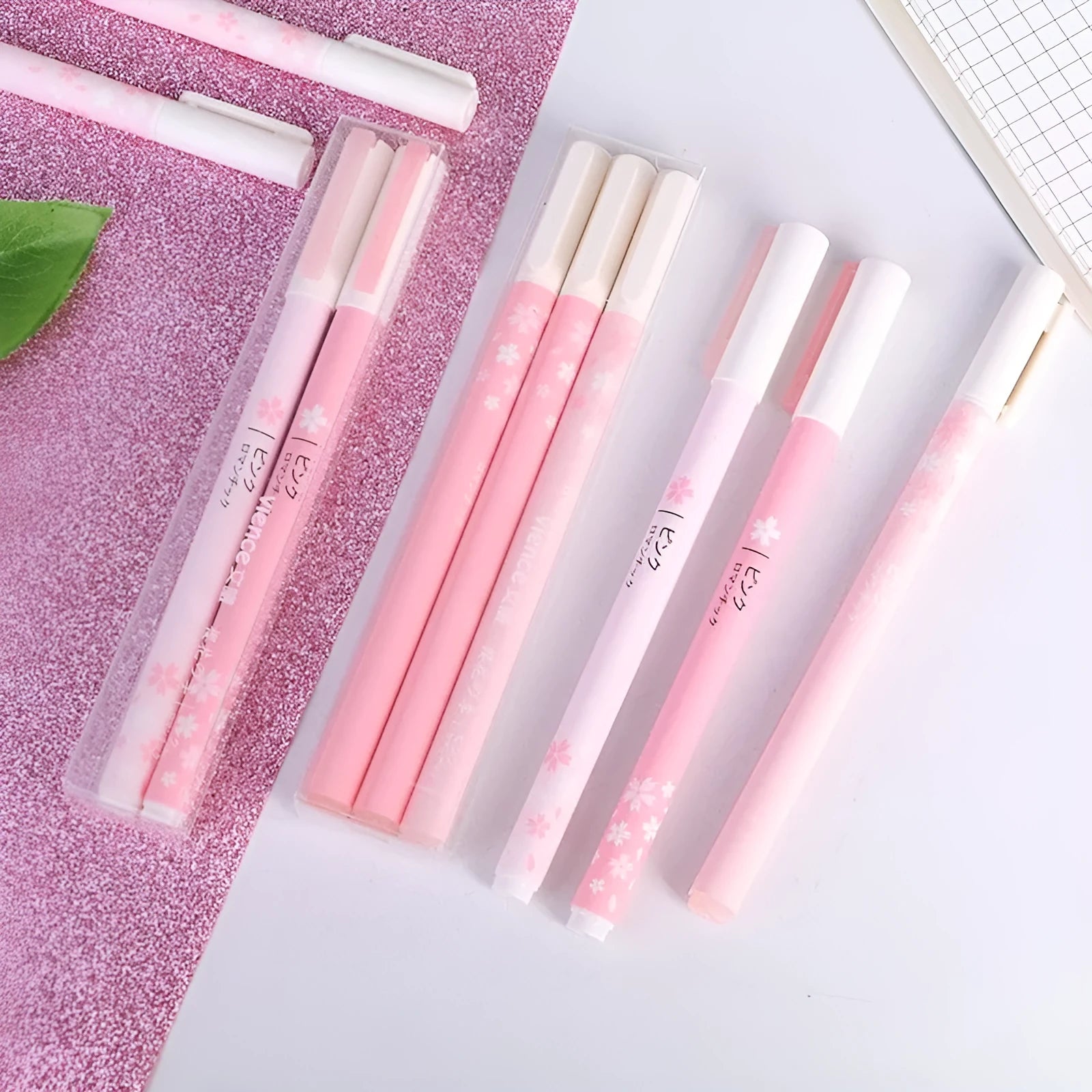 Sakura gel pen set showing plastic body pens with 0.5mm and 0.38mm needle tip options in boxed packaging