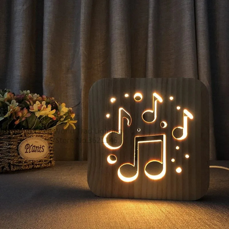 Square pine wood frame USB LED atmosphere lamp emitting warm white light on a desk.