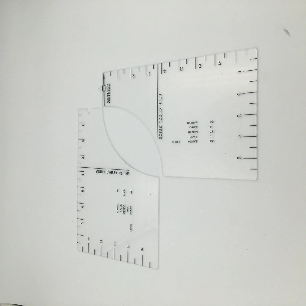 Transparent acrylic sewing ruler template for T-shirt patch alignment showing etched measurement markings