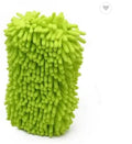 Silvery green chenille microfiber car wash sponge on a car bonnet.