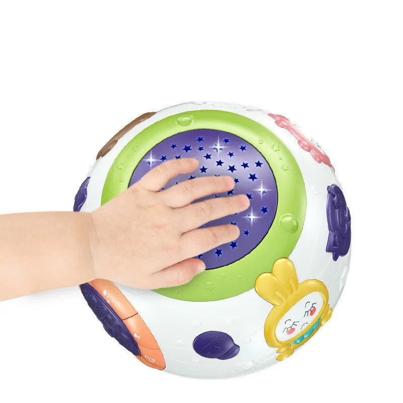 White plastic starry sky night light projector for children with control button on top.