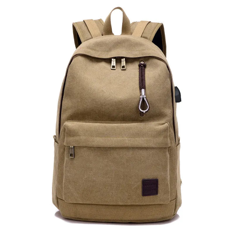 Coffee-coloured canvas backpack with USB charging port and multiple compartments.