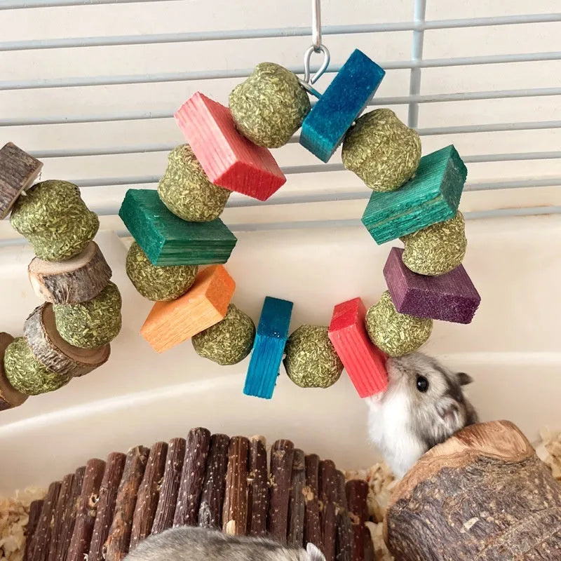 Hamster toy with Totoro-shaped rings, straw balls, and applewood molar rods for small pets