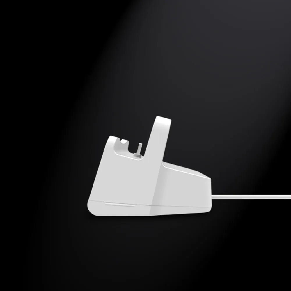White headphone charging base with fashionable last design on wooden surface