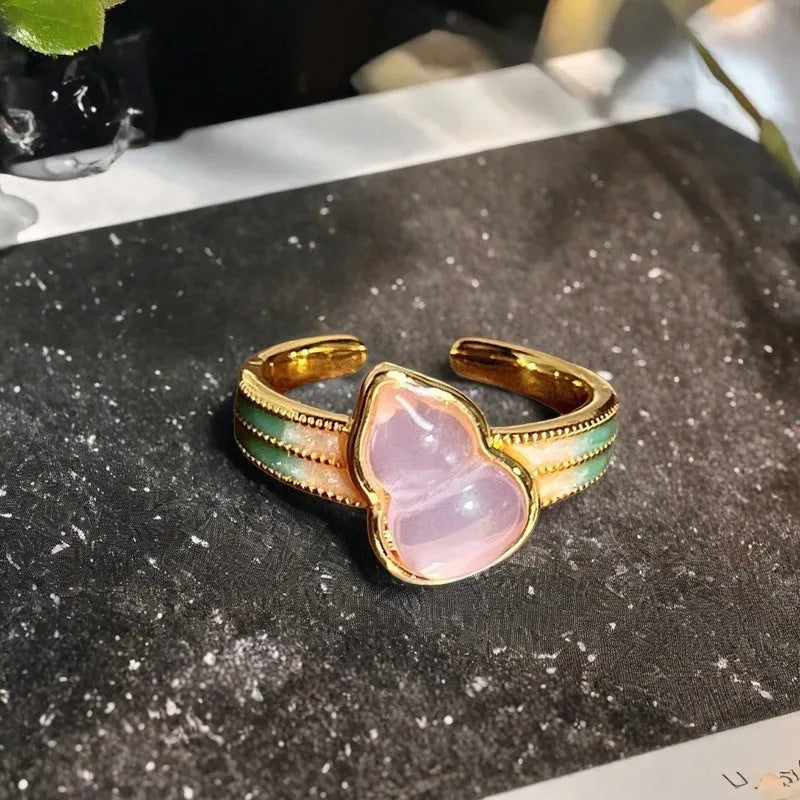 Adjustable copper ring with New Chinese style gourd, flower, and bow design in a vintage oil drip pattern.