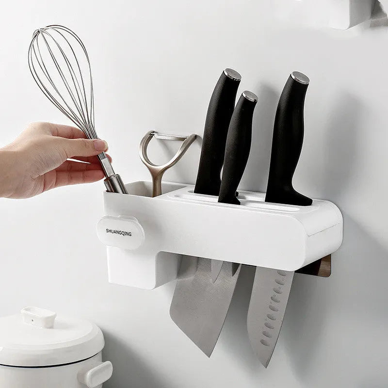 White plastic knife rack on kitchen countertop showing modern simple design