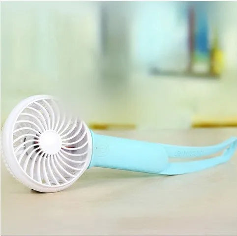 Blue mini USB hand fan with 200mm blades, adjustable speed controls, and a rechargeable battery on a desk
