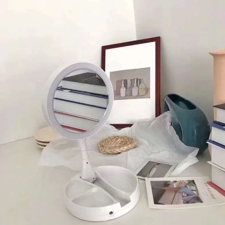 White acrylic LED vanity mirror with double-sided storage compartments and USB charging port