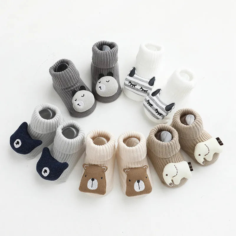 Baby socks with silicone anti-slip grips on sole, mid-height tube design in combed cotton
