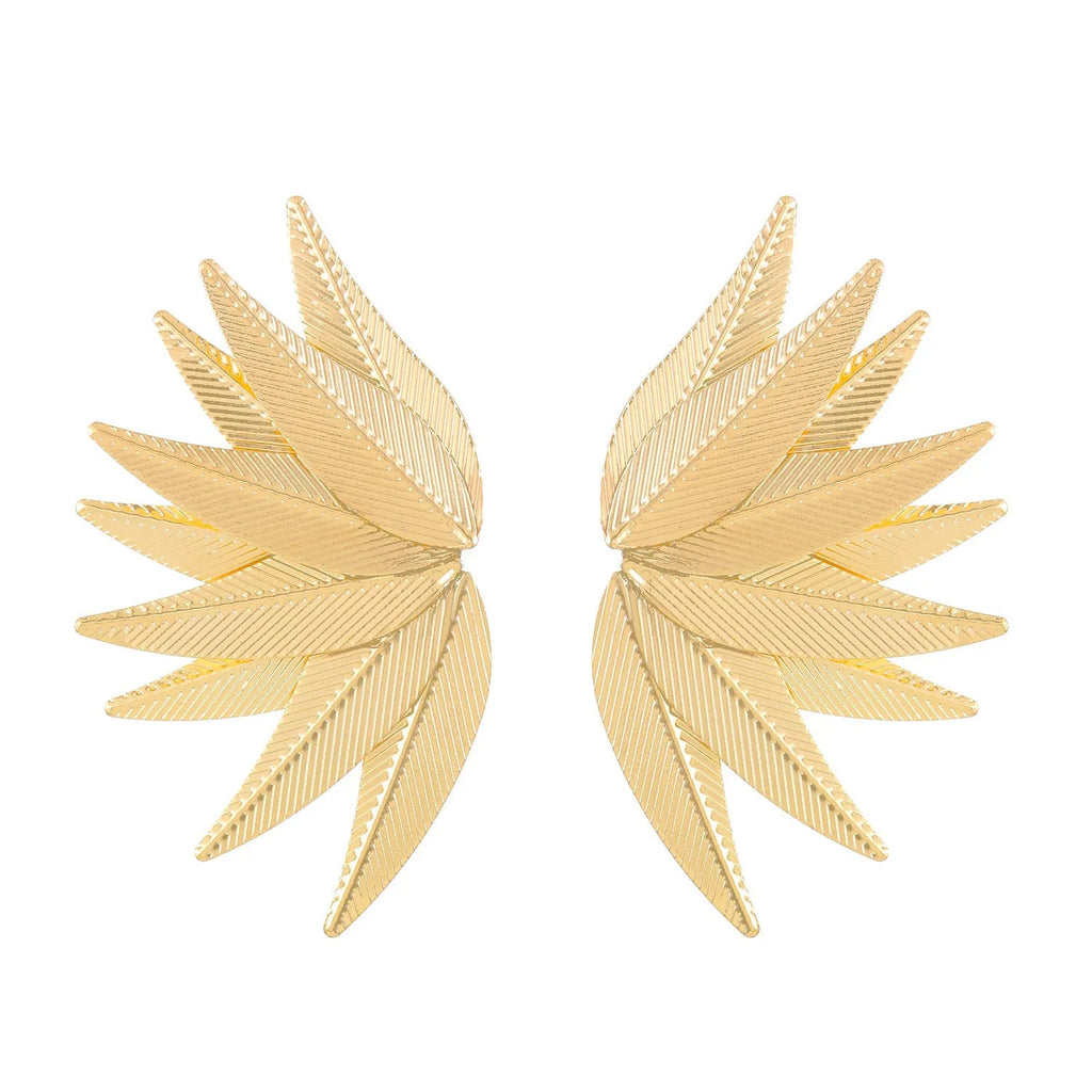Gold and white leaf-shaped alloy patch earrings with botanical design details
