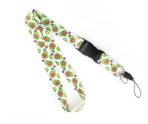 Polyester lanyard with double-sided avocado cartoon print and plastic buckle, shown at full 45cm length.