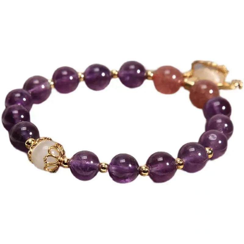 Handmade women's copper bracelet with natural amethyst stone and real gold longevity lock centrepiece
