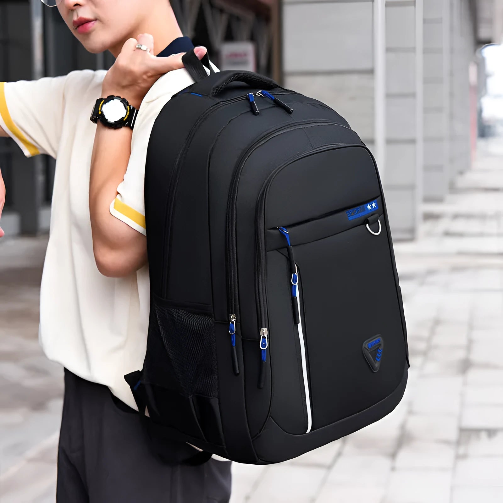 Men's Oxford cloth schoolbag in black with letter pattern showing air pillow belt and large capacity design