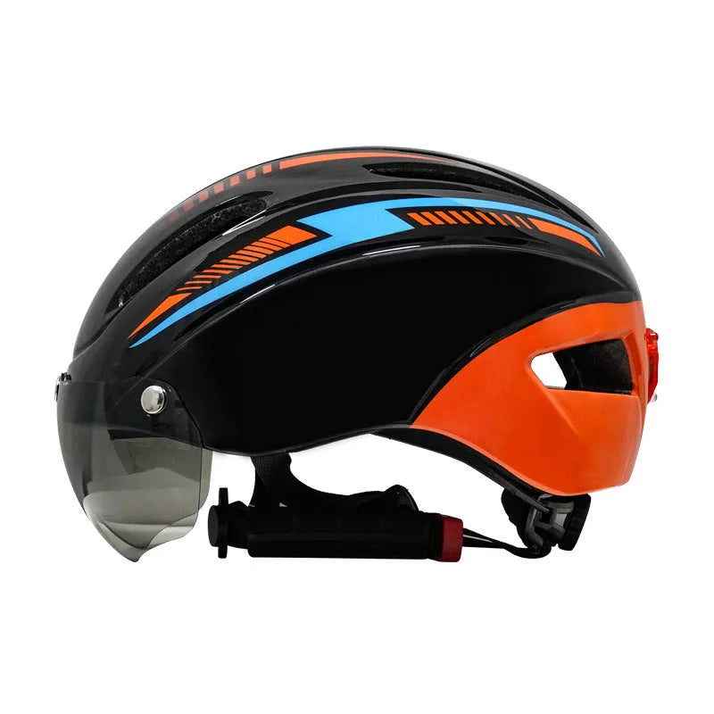 Adult bicycle helmet with integrated red taillight on the rear, shown in a black and blue colour variant.