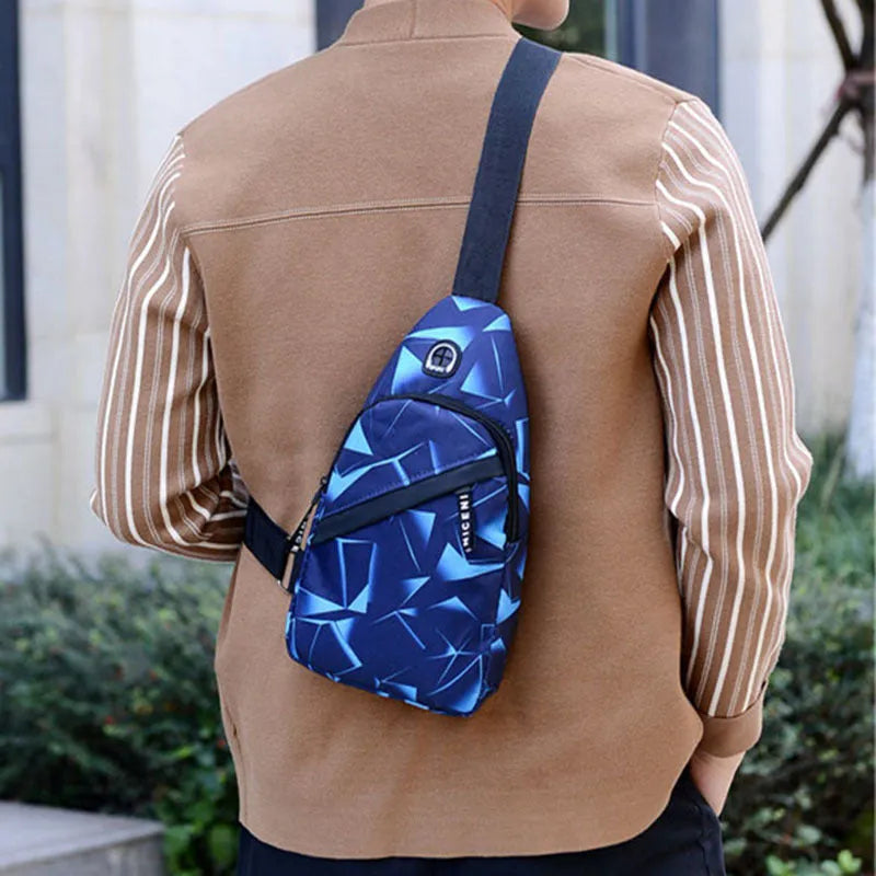Blue Oxford cloth crossbody chest bag for men with an earphone hole and zipper.