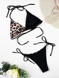 Women's red leopard print halter bikini with lace-up front and adjustable side ties