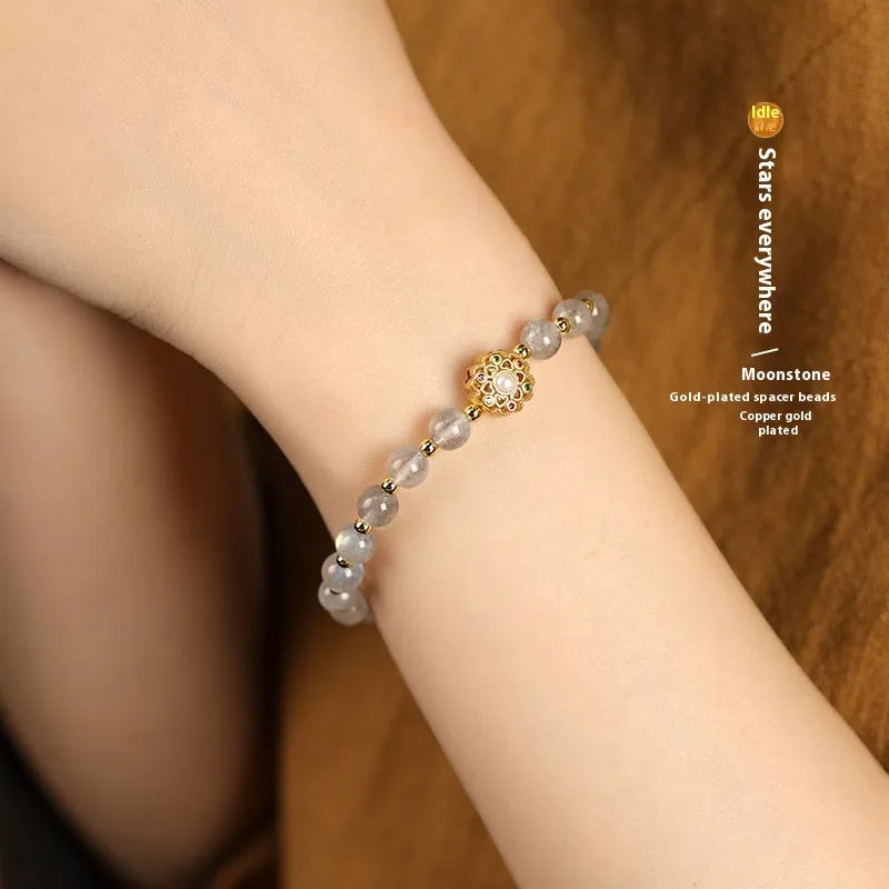 Hand-woven gray moonstone crystal bracelet with sunstone and strawberry quartz 6mm beads showing sun moon elements