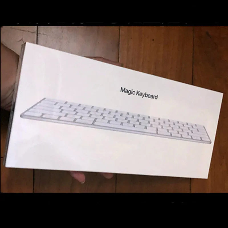 Brand new white Apple Bluetooth G6 wireless keyboard with multimedia keys in metal box.