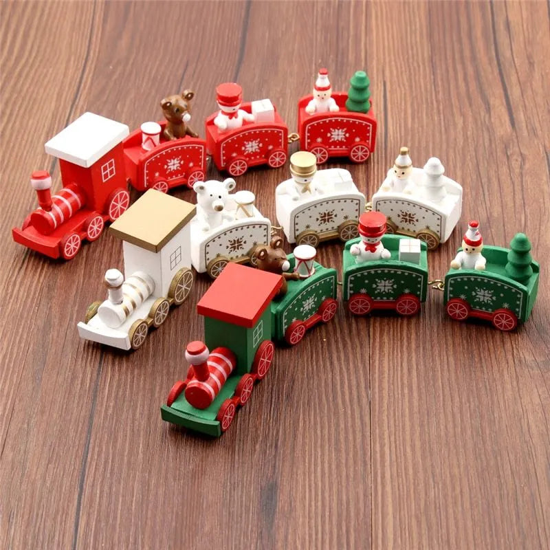 Set of four mini wood train toys in red white and green with painted passengers for shelf display